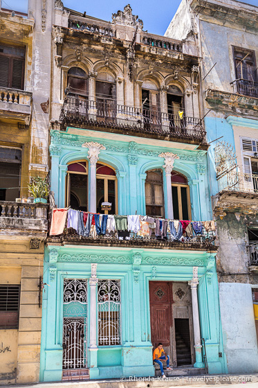 Old building with laundry hanging on a line.